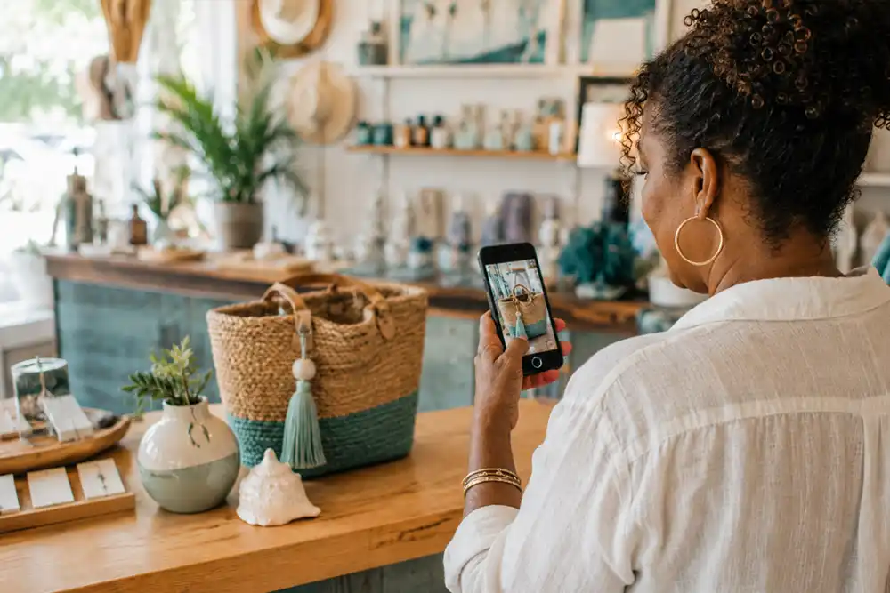 Golden Isles shop owner photographing a product for her Google Business Profile